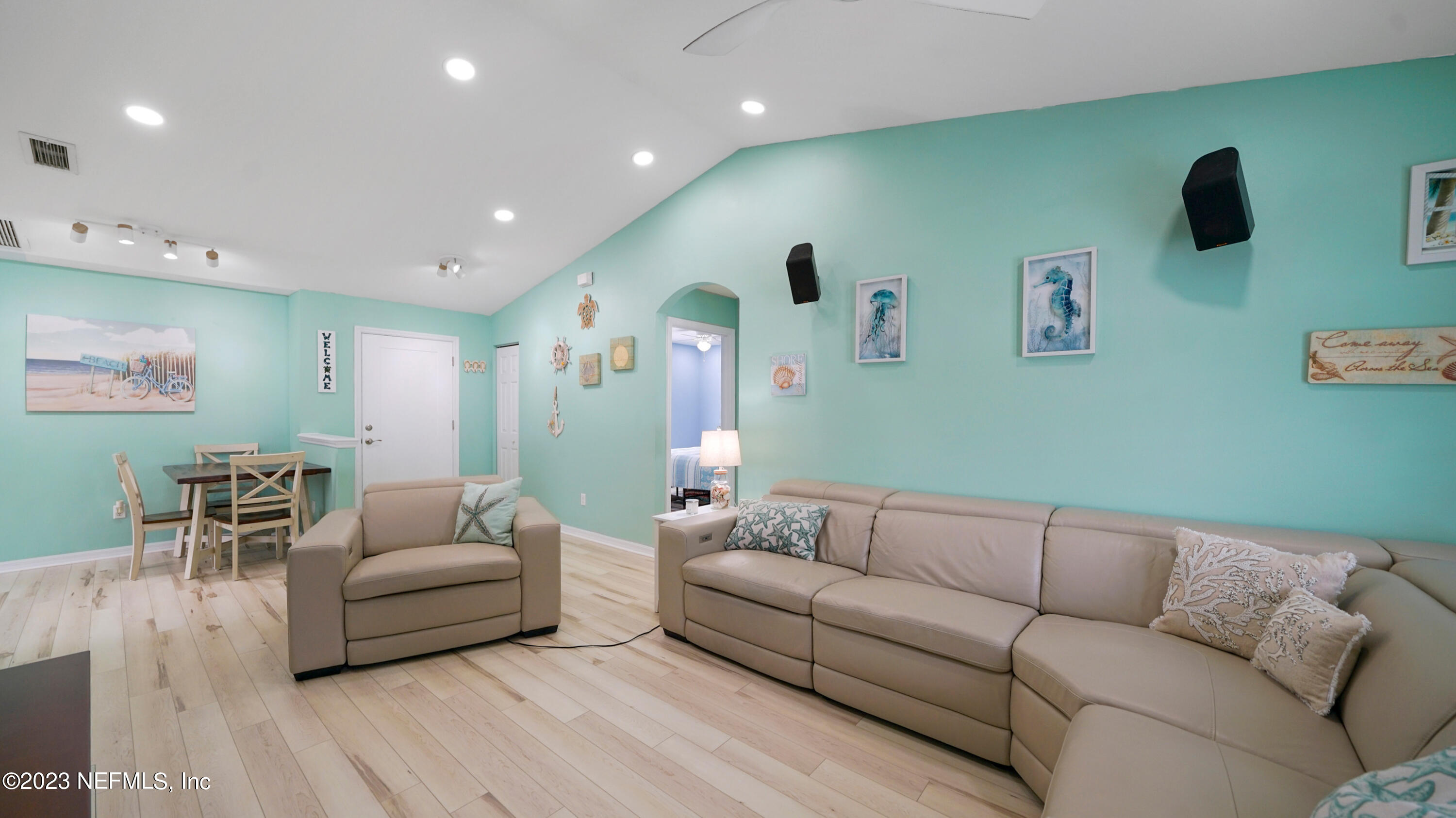 321 West Jayce Way St. Augustine, FL 32084 - Photo 2 of 34 a living room with furniture and a wooden floor