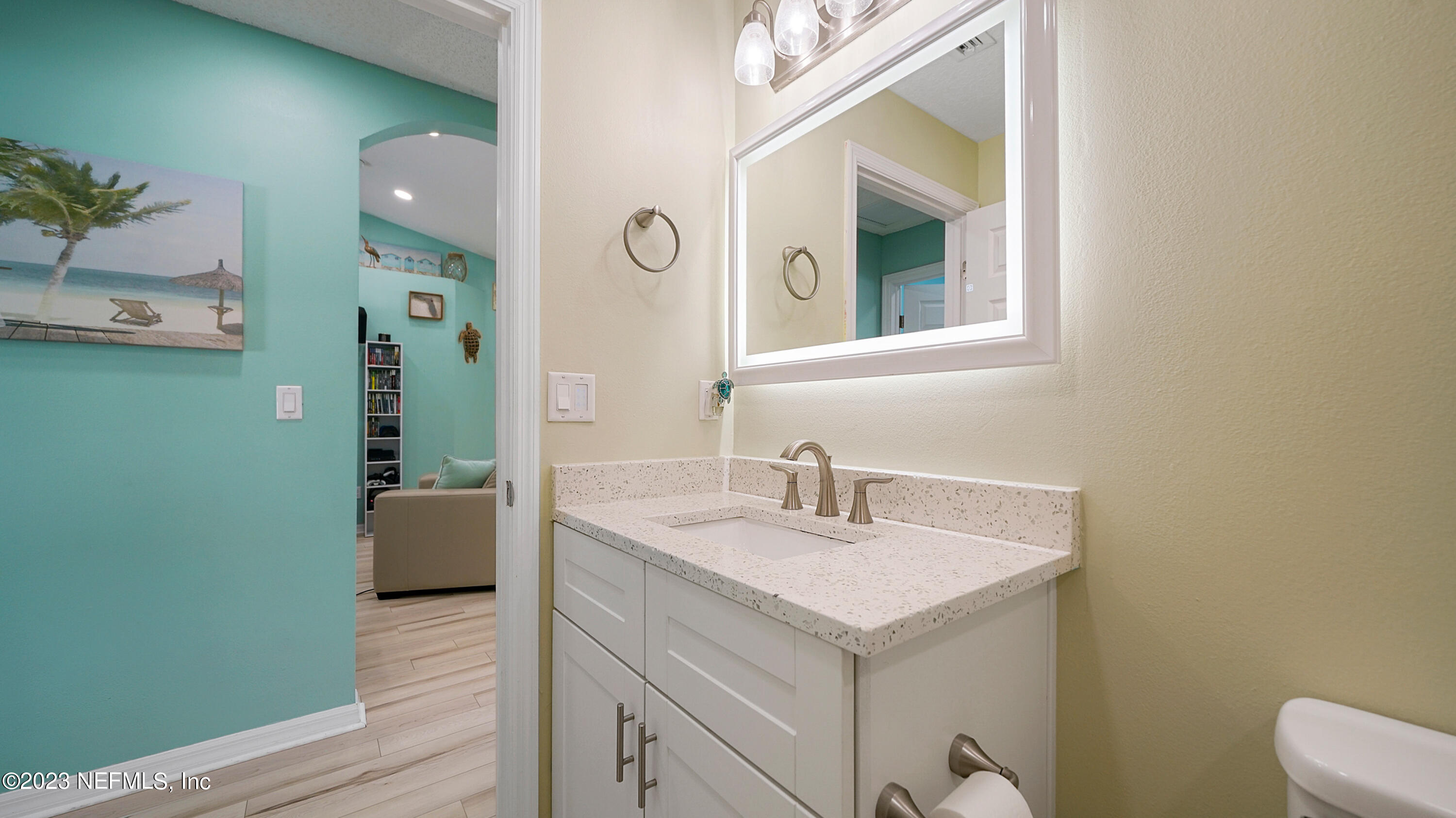 321 West Jayce Way St. Augustine, FL 32084 - Photo 21 of 34 a bathroom with a sink and a mirror