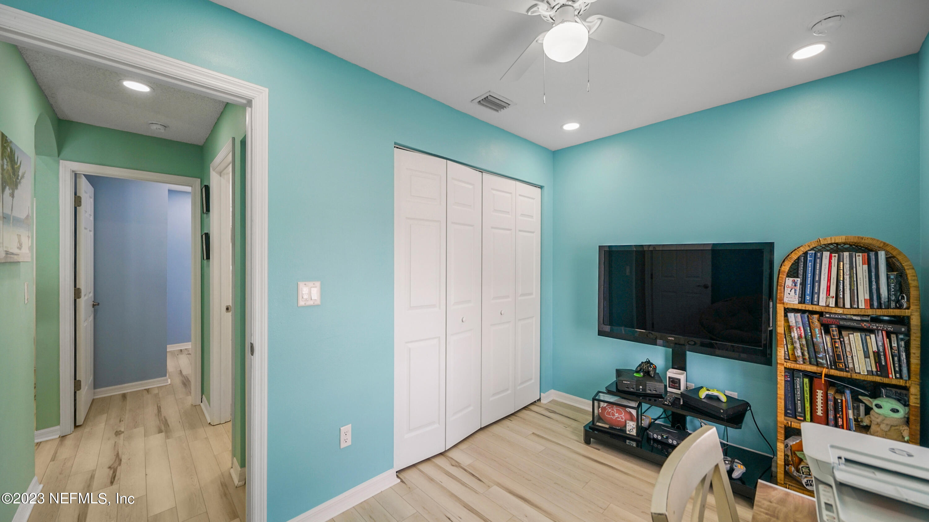321 West Jayce Way St. Augustine, FL 32084 - Photo 23 of 34 a living room with fireplace furniture and a flat screen tv