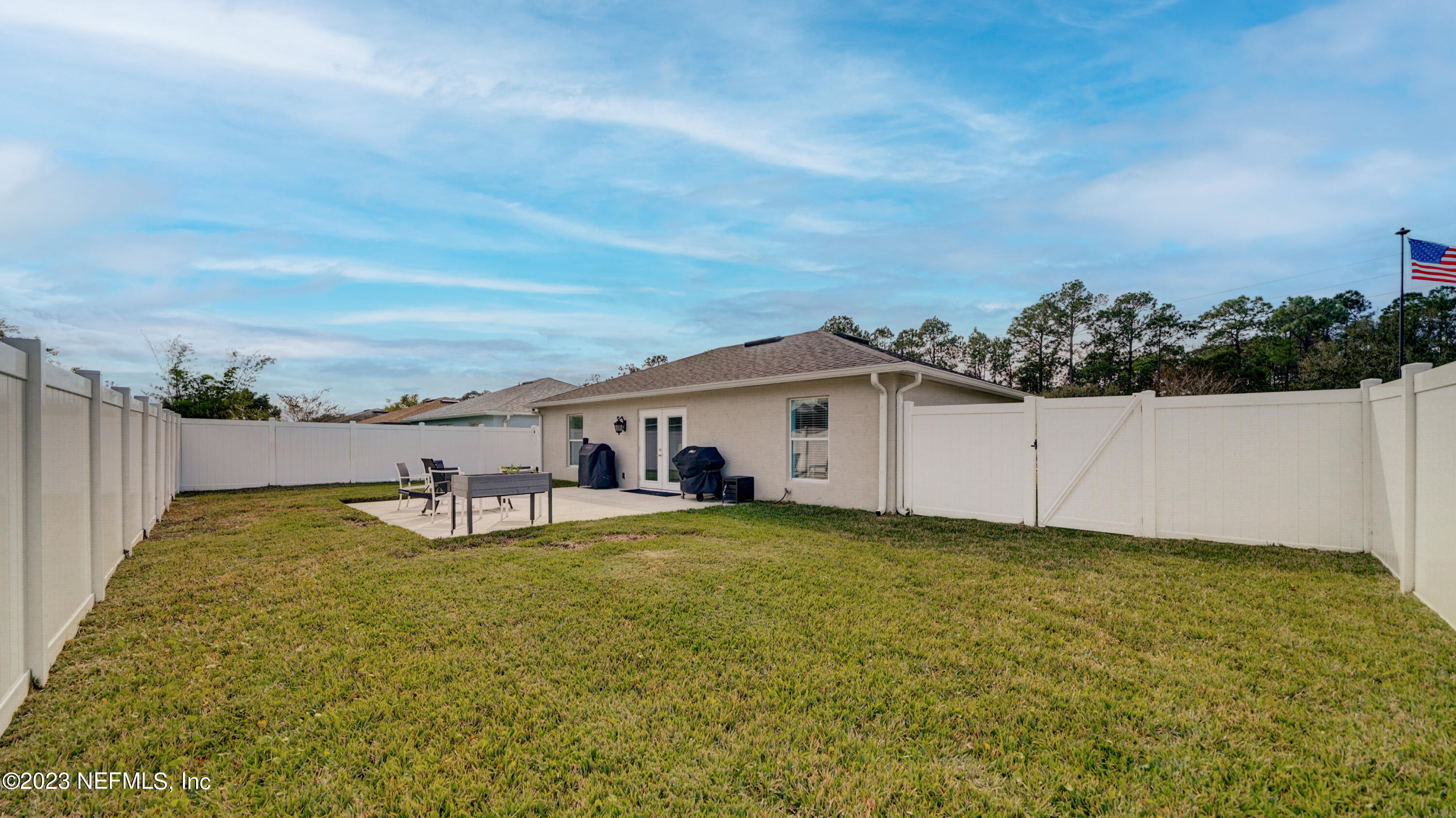 321 West Jayce Way St. Augustine, FL 32084 - Photo 26 of 34 a view of a house with a yard