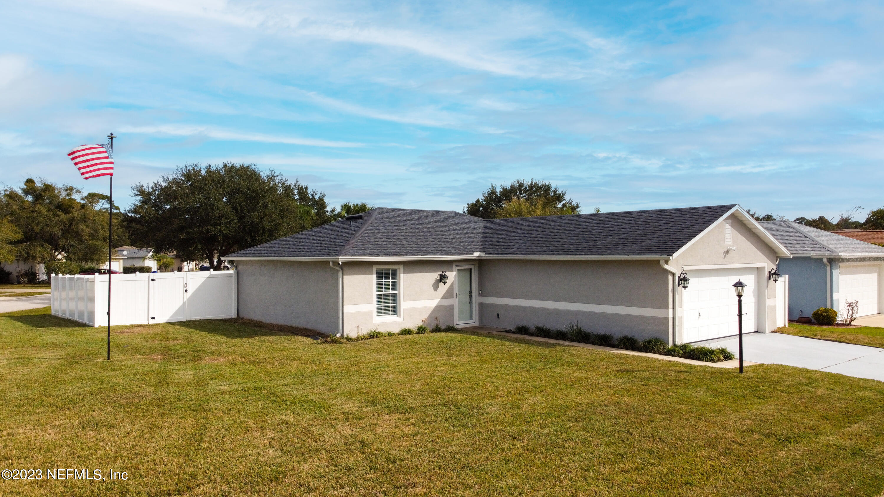 321 West Jayce Way St. Augustine, FL 32084 - Photo 28 of 34 a house view with a garden space