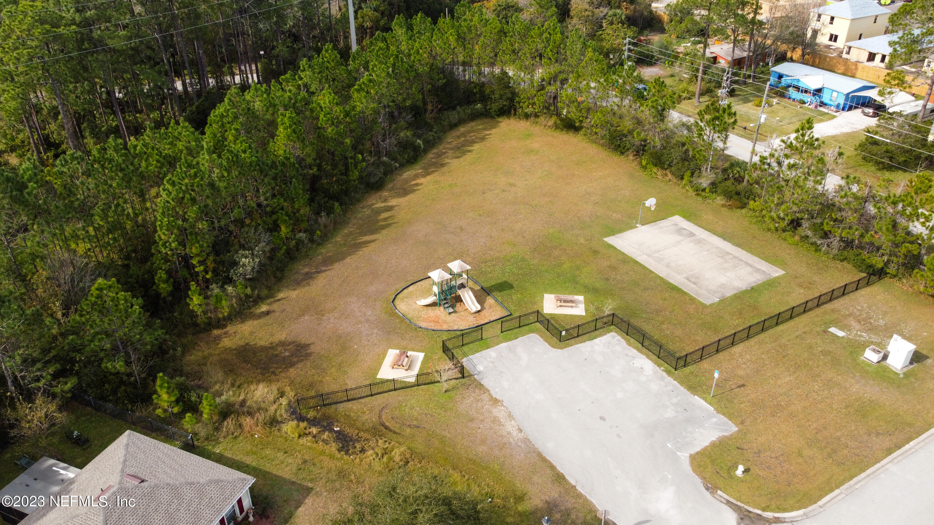 321 West Jayce Way St. Augustine, FL 32084 - Photo 34 of 34 an aerial view of a house with a yard