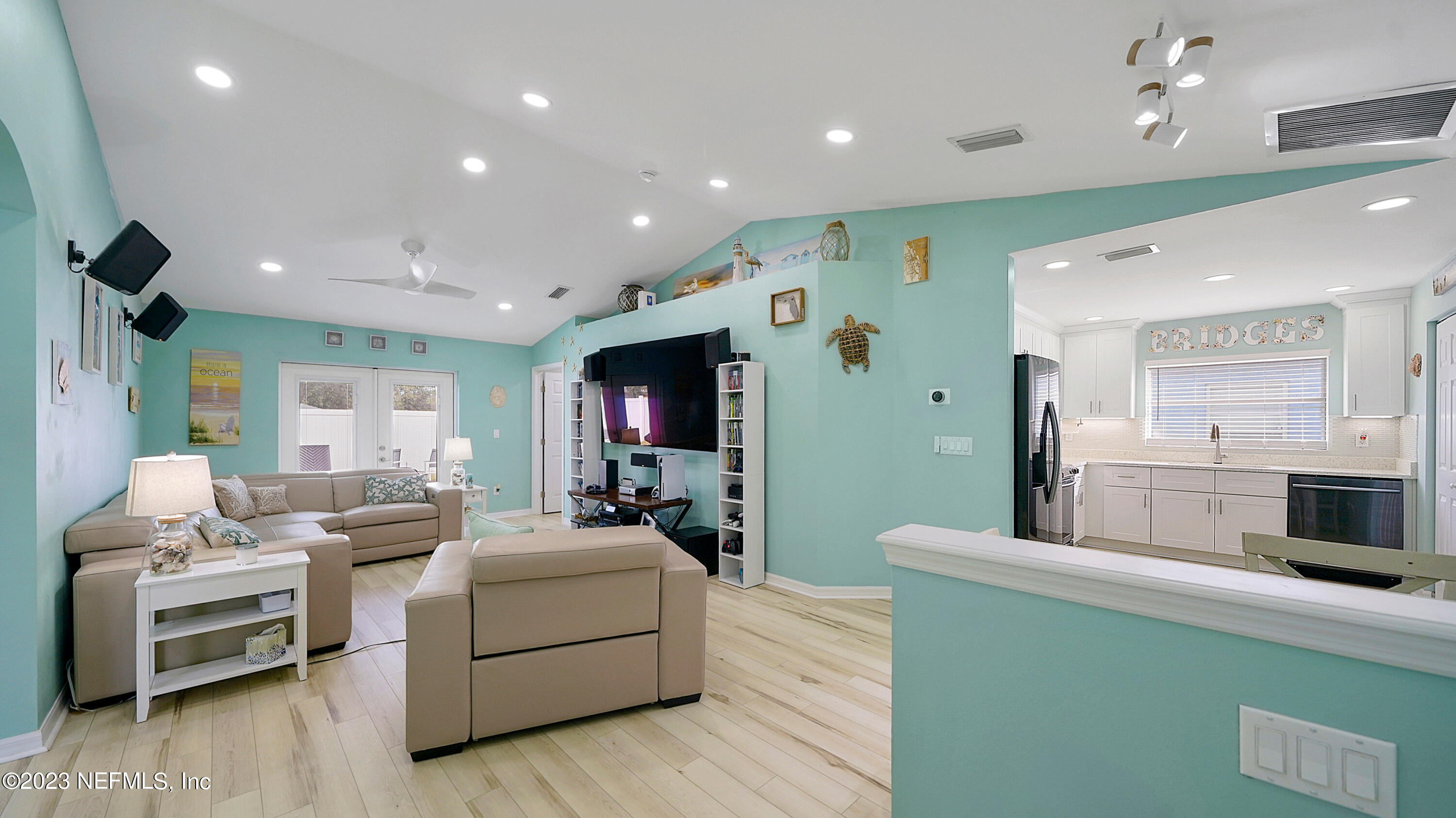 321 West Jayce Way St. Augustine, FL 32084 - Photo 4 of 34 a living room with furniture and a flat screen tv