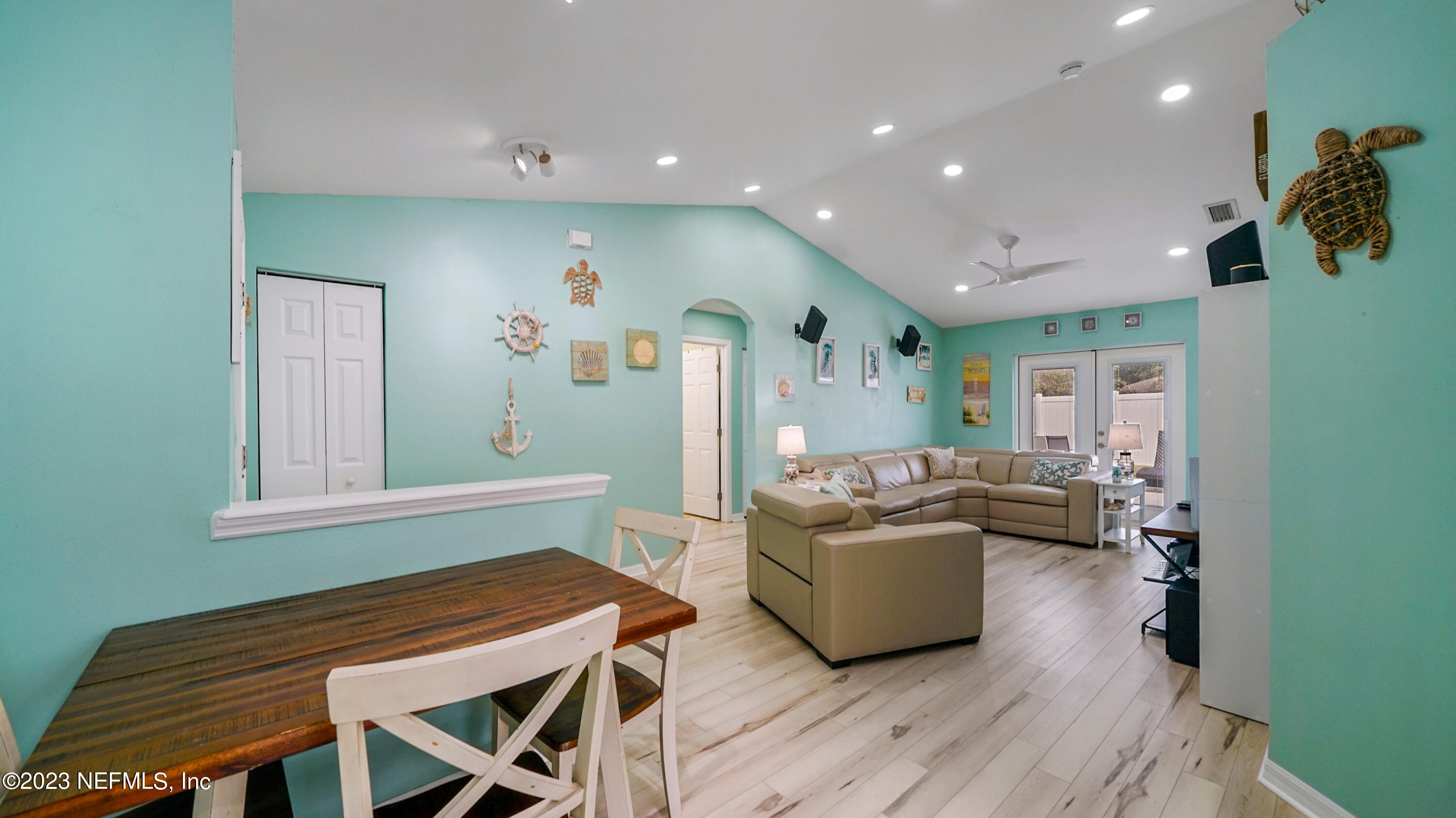 321 West Jayce Way St. Augustine, FL 32084 - Photo 5 of 34 a living room with furniture and a wooden floor