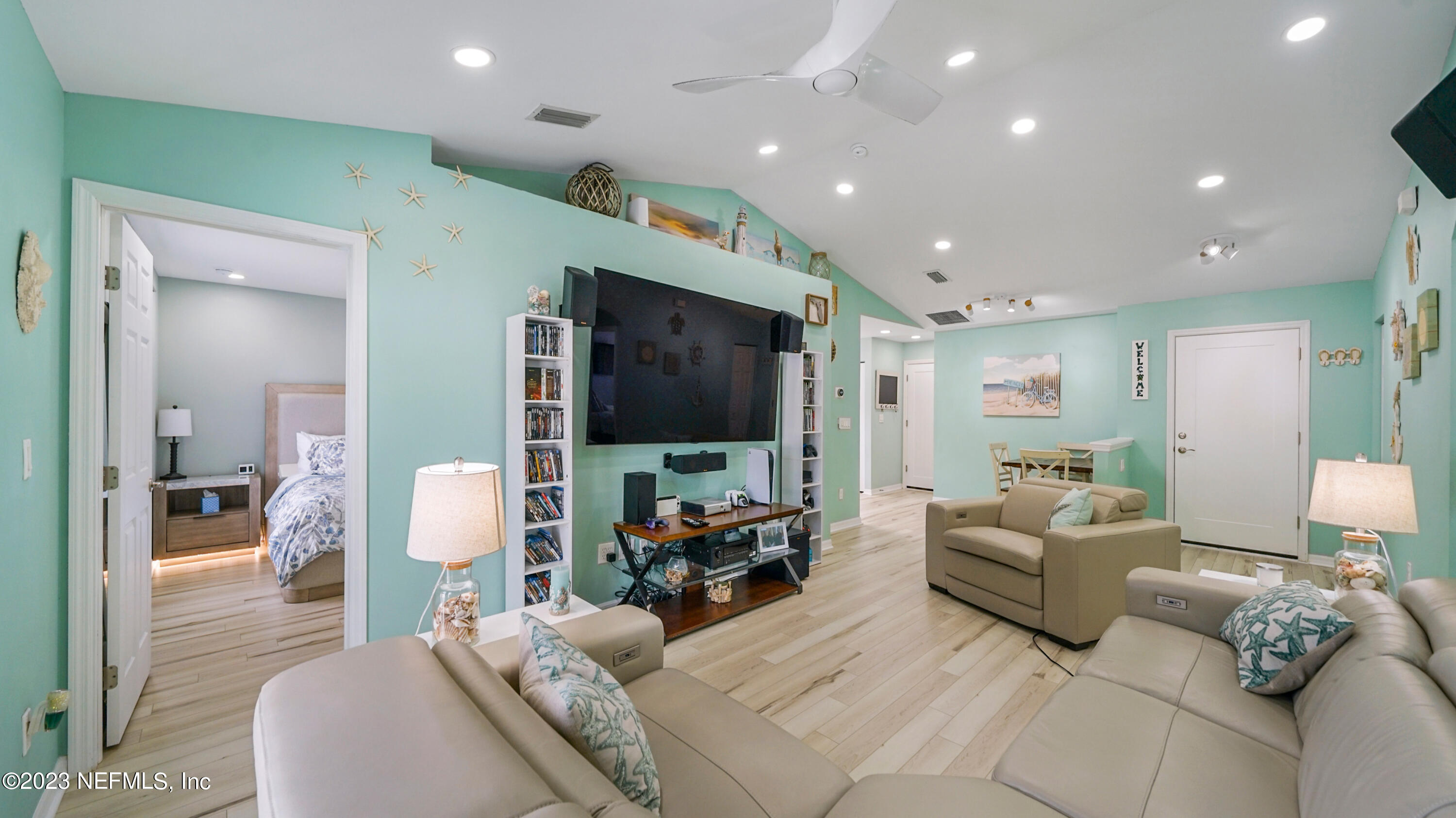 321 West Jayce Way St. Augustine, FL 32084 - Photo 6 of 34 a living room with furniture and a flat screen tv