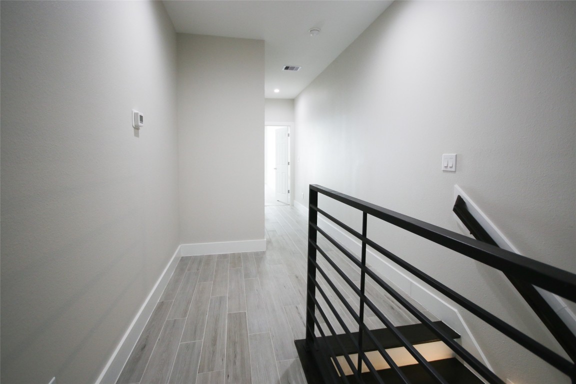 5113 Hershe Street, Unit B Houston, TX 77020 - Photo 28 of 44 a view of wooden floor