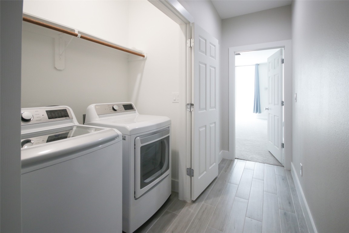 5113 Hershe Street, Unit B Houston, TX 77020 - Photo 30 of 44 a view of utility room with washer and dryer