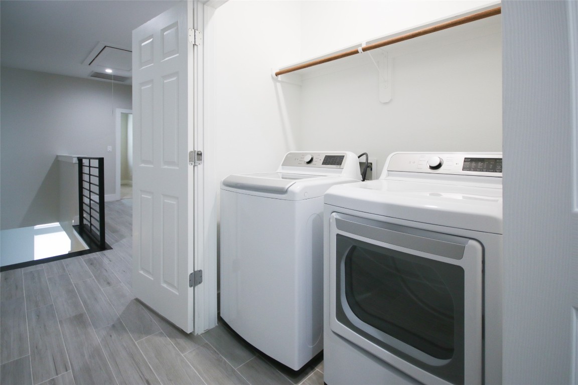 5113 Hershe Street, Unit B Houston, TX 77020 - Photo 31 of 44 a utility room with dryer and washer