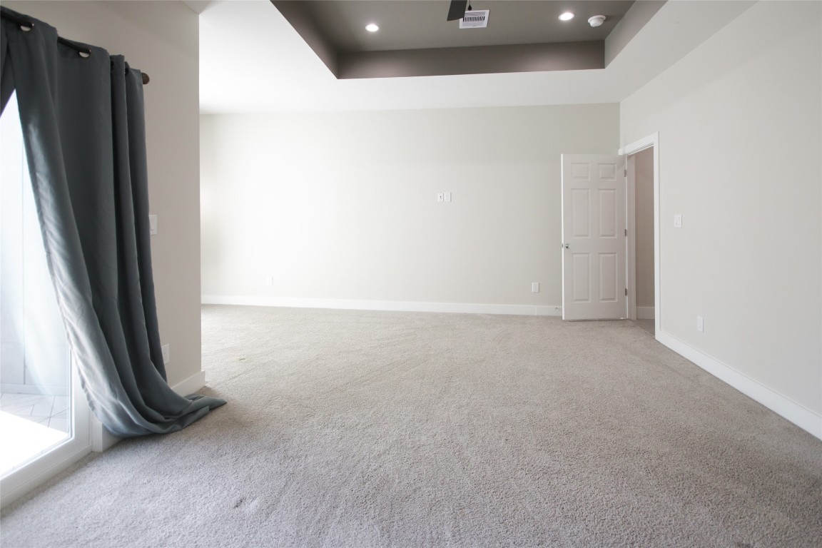 5113 Hershe Street, Unit B Houston, TX 77020 - Photo 35 of 44 an empty room with wooden floor and a window