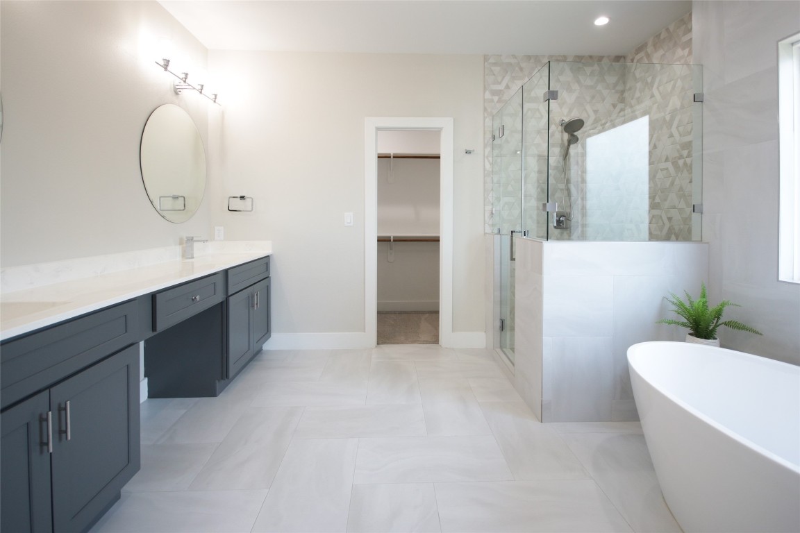 5113 Hershe Street, Unit B Houston, TX 77020 - Photo 36 of 44 a bathroom with a sink a toilet and shower