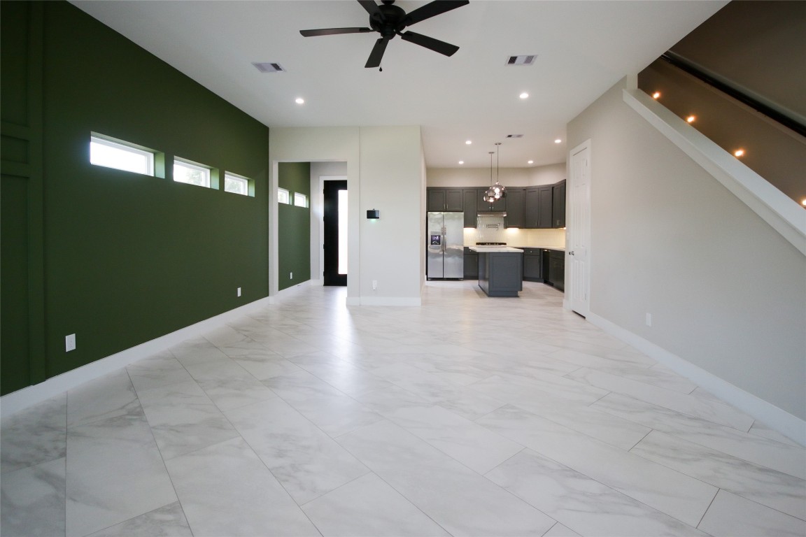 5113 Hershe Street, Unit B Houston, TX 77020 - Photo 6 of 44 a view of a livingroom with a ceiling fan and window