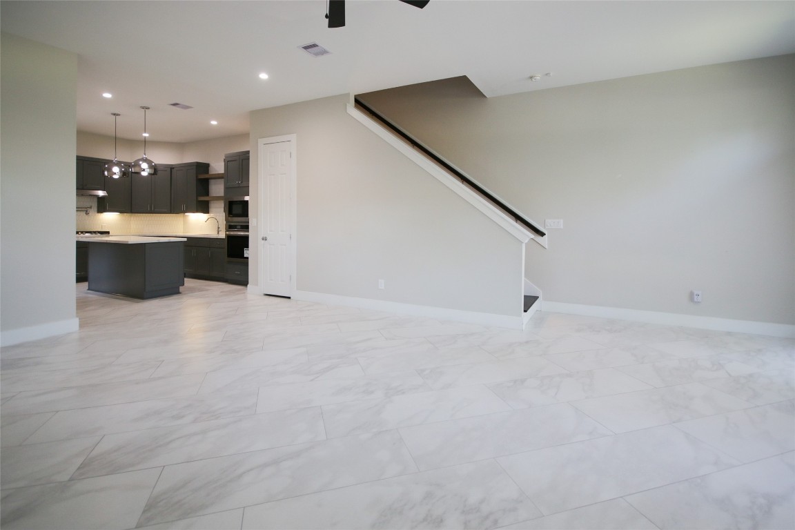 5113 Hershe Street, Unit B Houston, TX 77020 - Photo 7 of 44 a view of an empty room with a kitchen