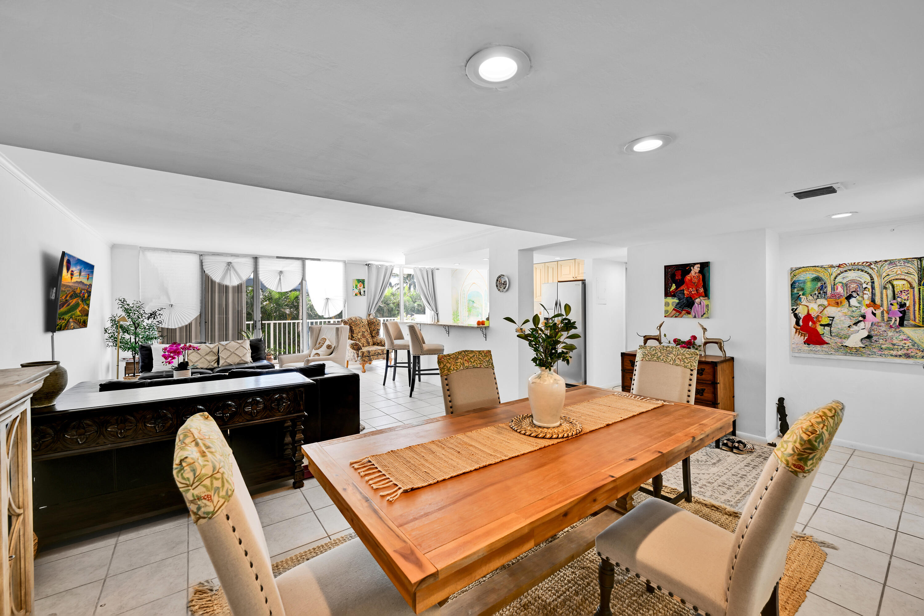 2860 South Ocean Boulevard, Unit 208 Palm Beach, FL 33480 - Photo 6 of 18 a dining room with furniture and a floor to ceiling window