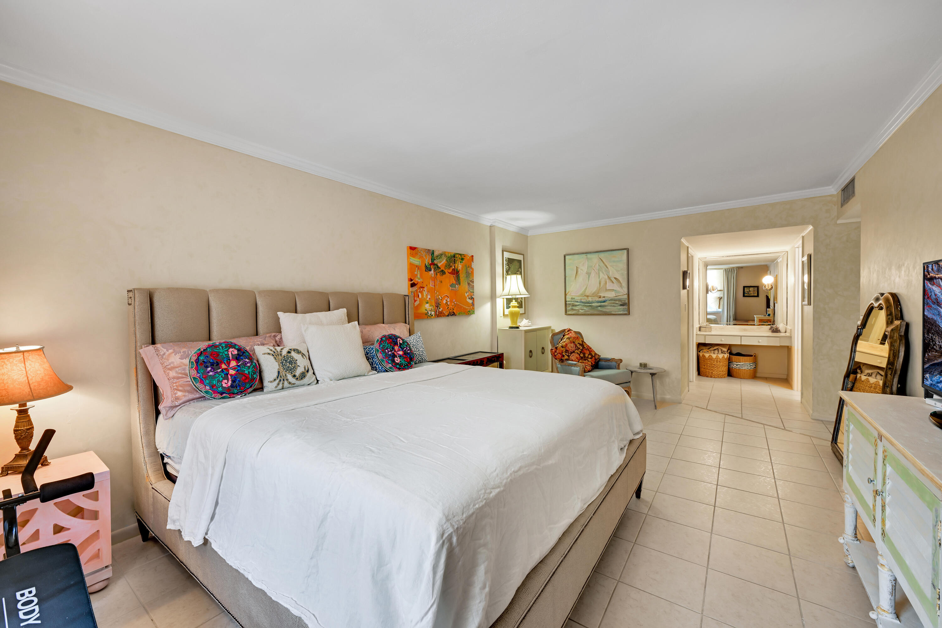 2860 South Ocean Boulevard, Unit 208 Palm Beach, FL 33480 - Photo 9 of 18 a bed room with a bed and a view of bedroom