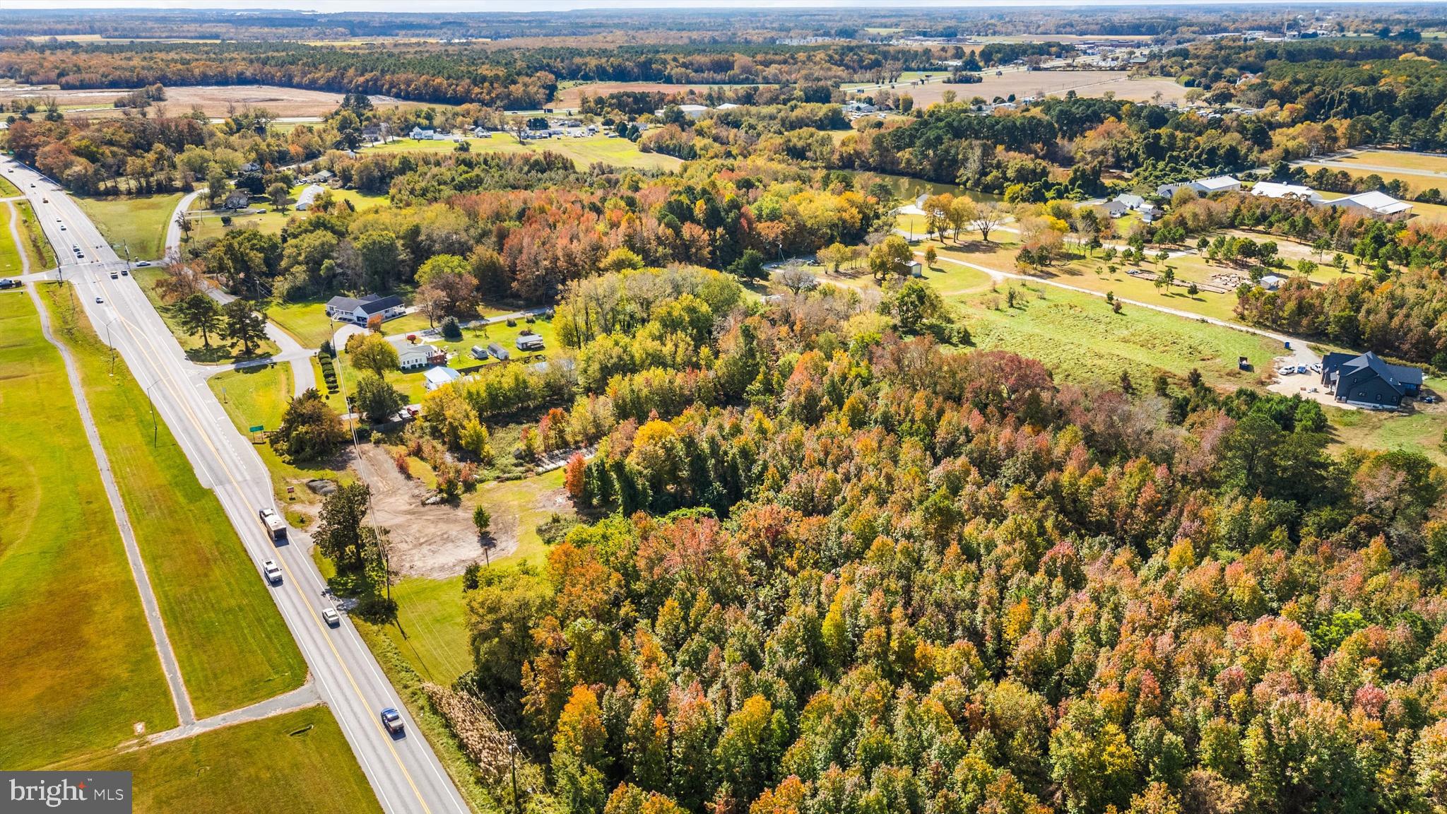 10307 Racetrack Road Berlin, MD 21811 - Photo 5 of 12 an aerial view of residential houses with swimming pool