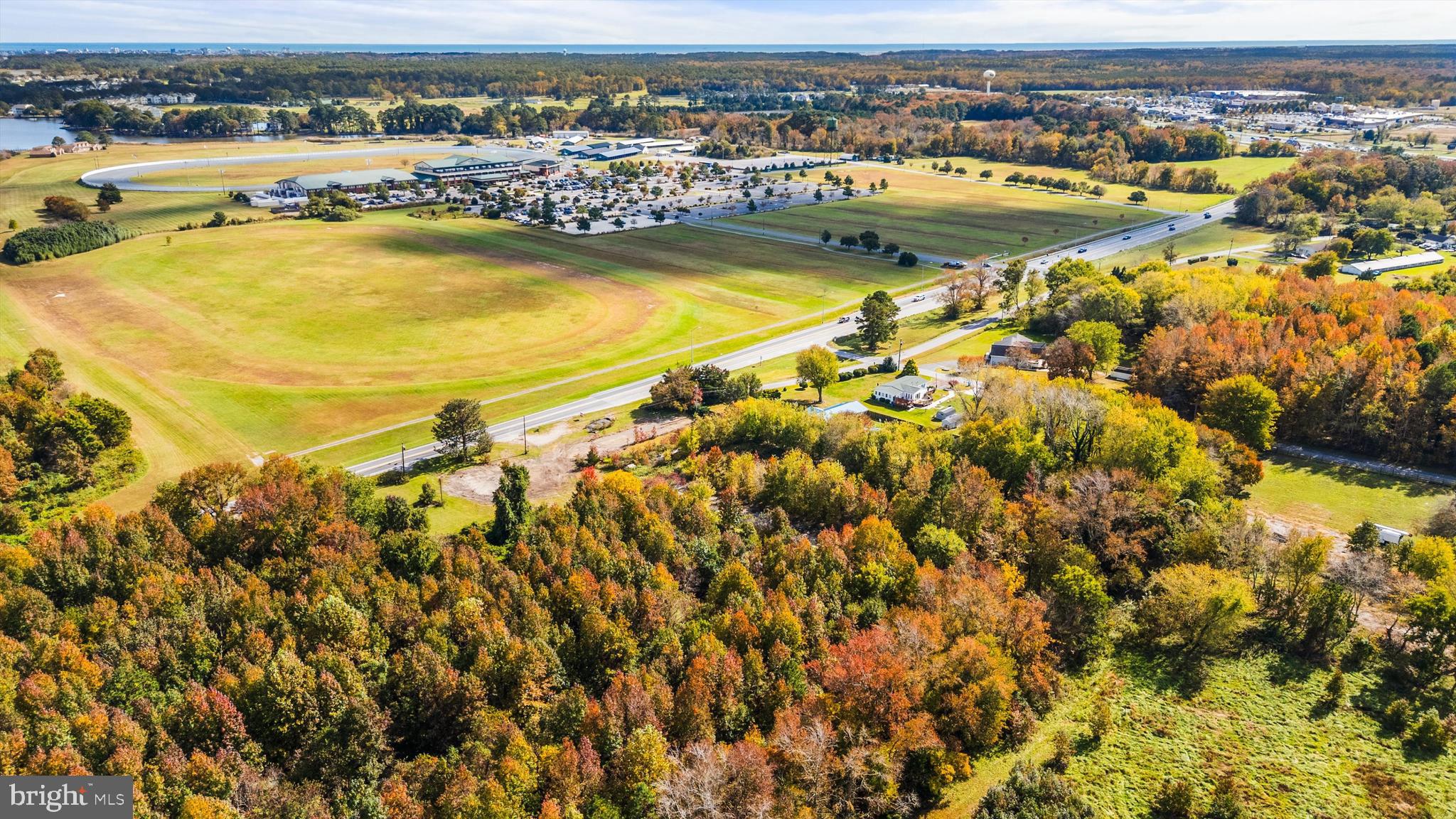 10307 Racetrack Road Berlin, MD 21811 - Photo 7 of 12 an aerial view of residential houses with outdoor space