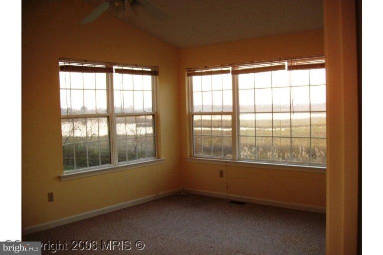 813 Long Point Road Grasonville, MD 21638 - Photo 22 of 27 an empty room with a window