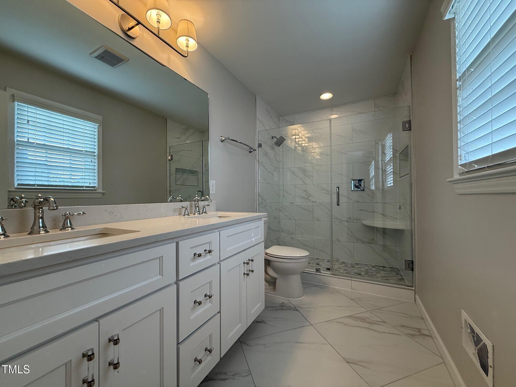 212 Sampson Street Raleigh, NC 27609 - Photo 21 of 33 Primary Bath