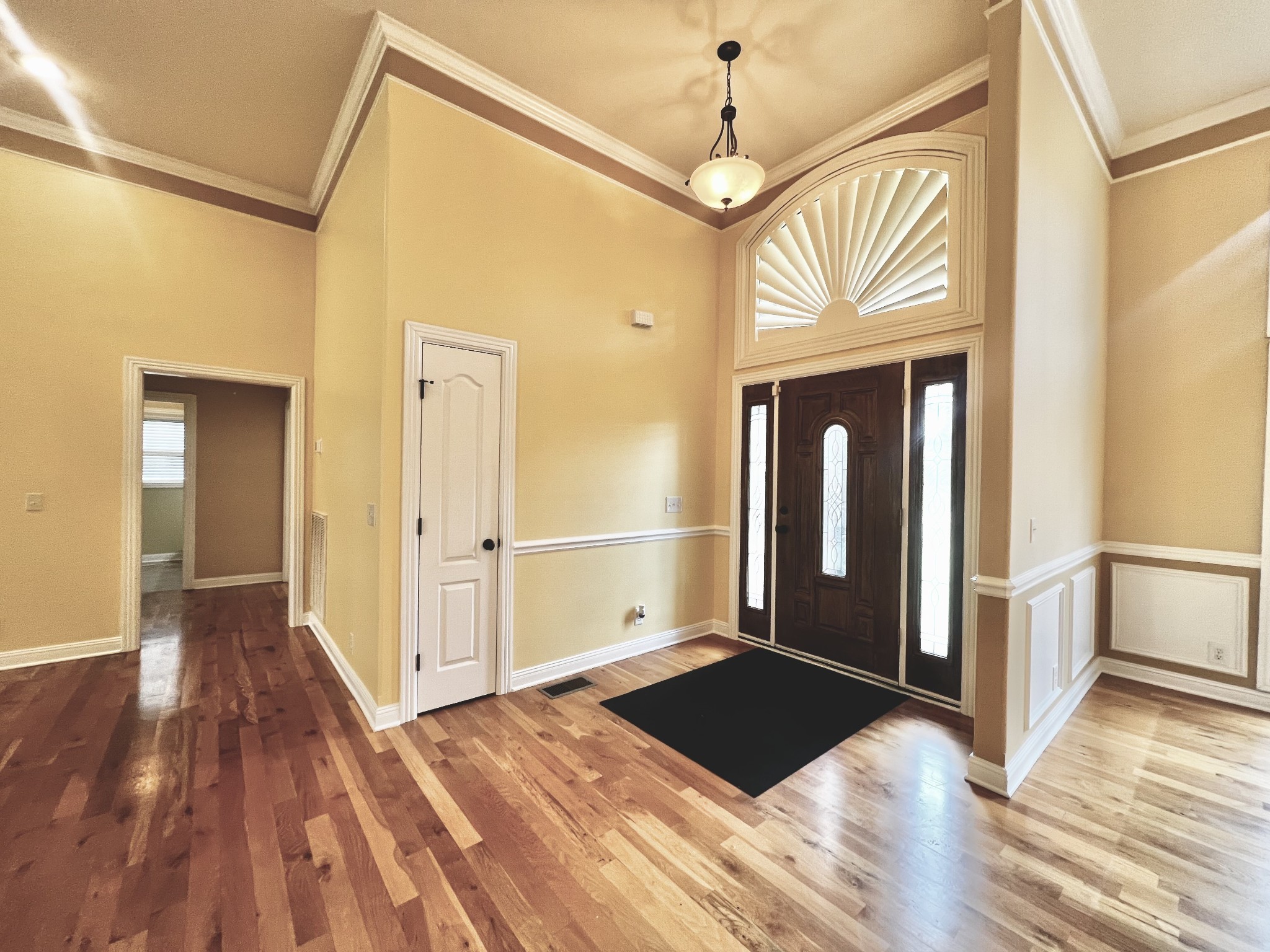 102 Spring View Place Cottontown, TN 37048 - Photo 23 of 40 a view of a hallway with wooden floor and staircase