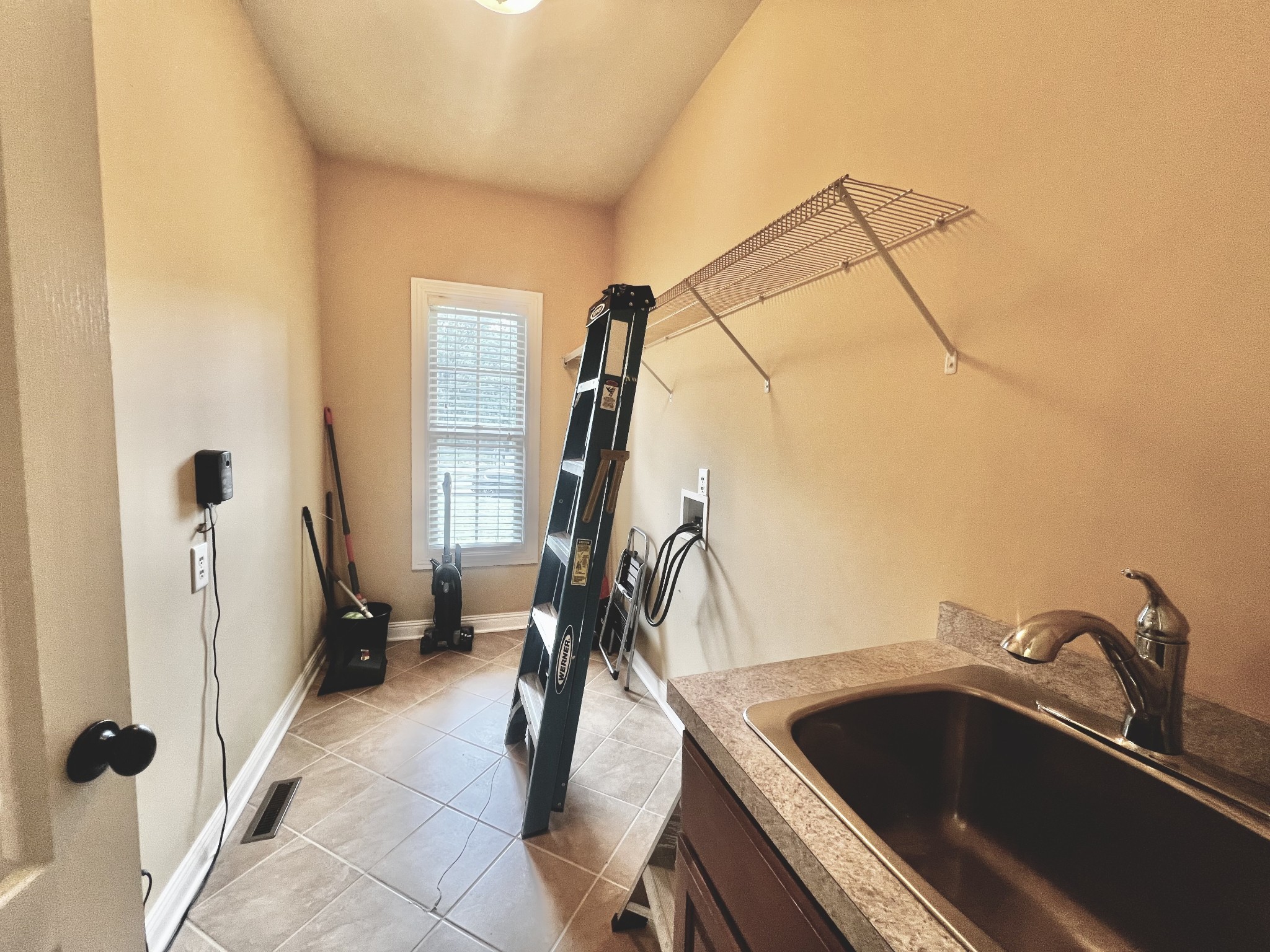 102 Spring View Place Cottontown, TN 37048 - Photo 27 of 40 a bathroom with a sink and mirror