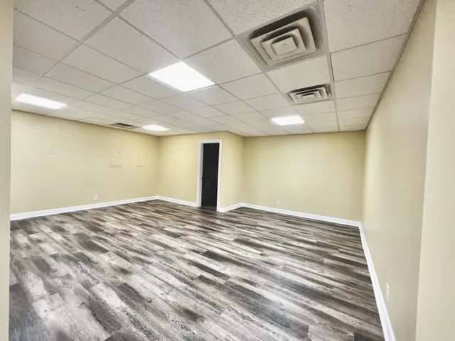 a bathroom with a toilet a sink and shower