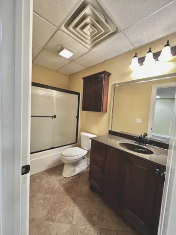 a view of a room with a wooden floor