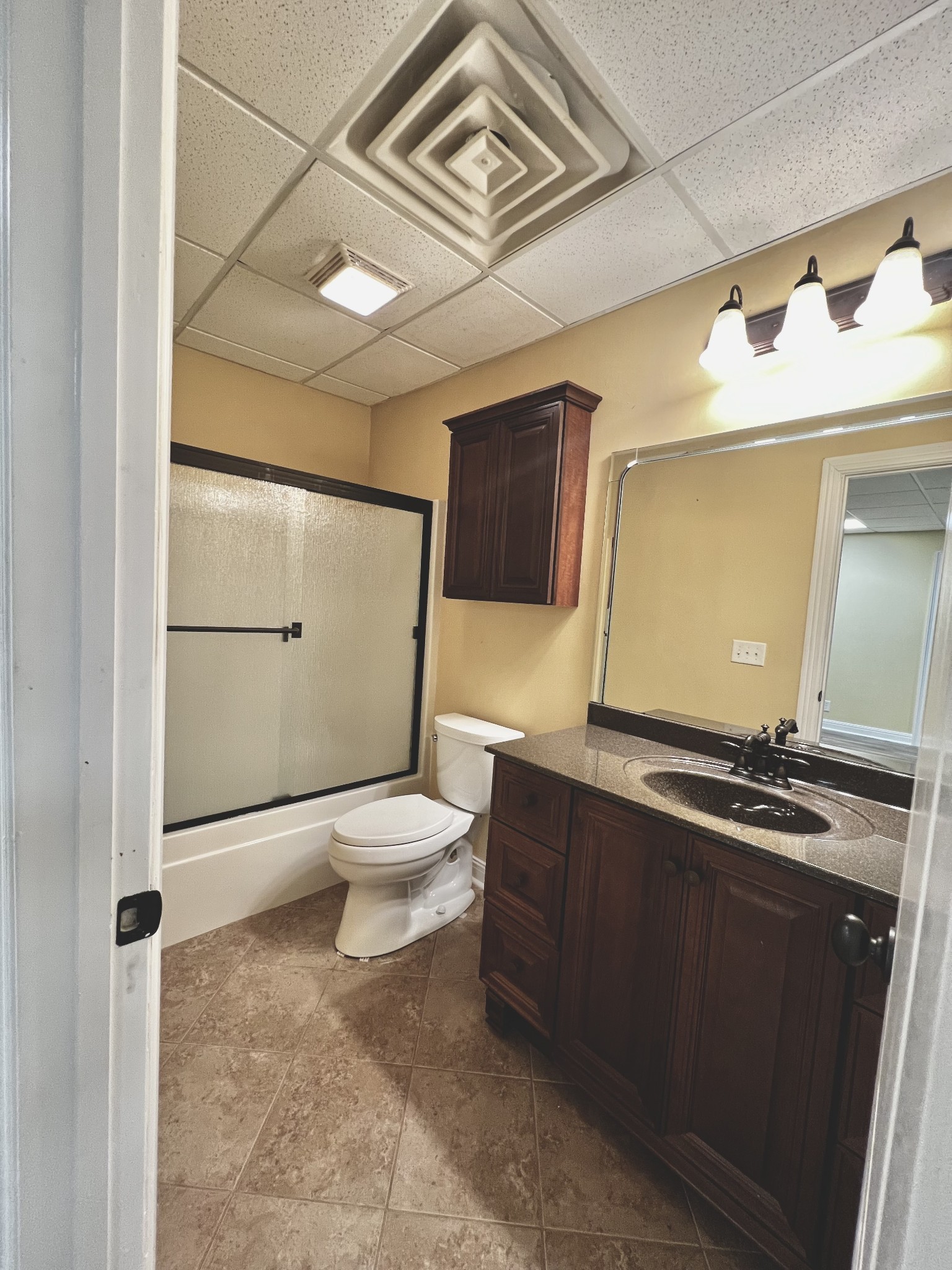 102 Spring View Place Cottontown, TN 37048 - Photo 33 of 40 a bathroom with a toilet a sink and shower