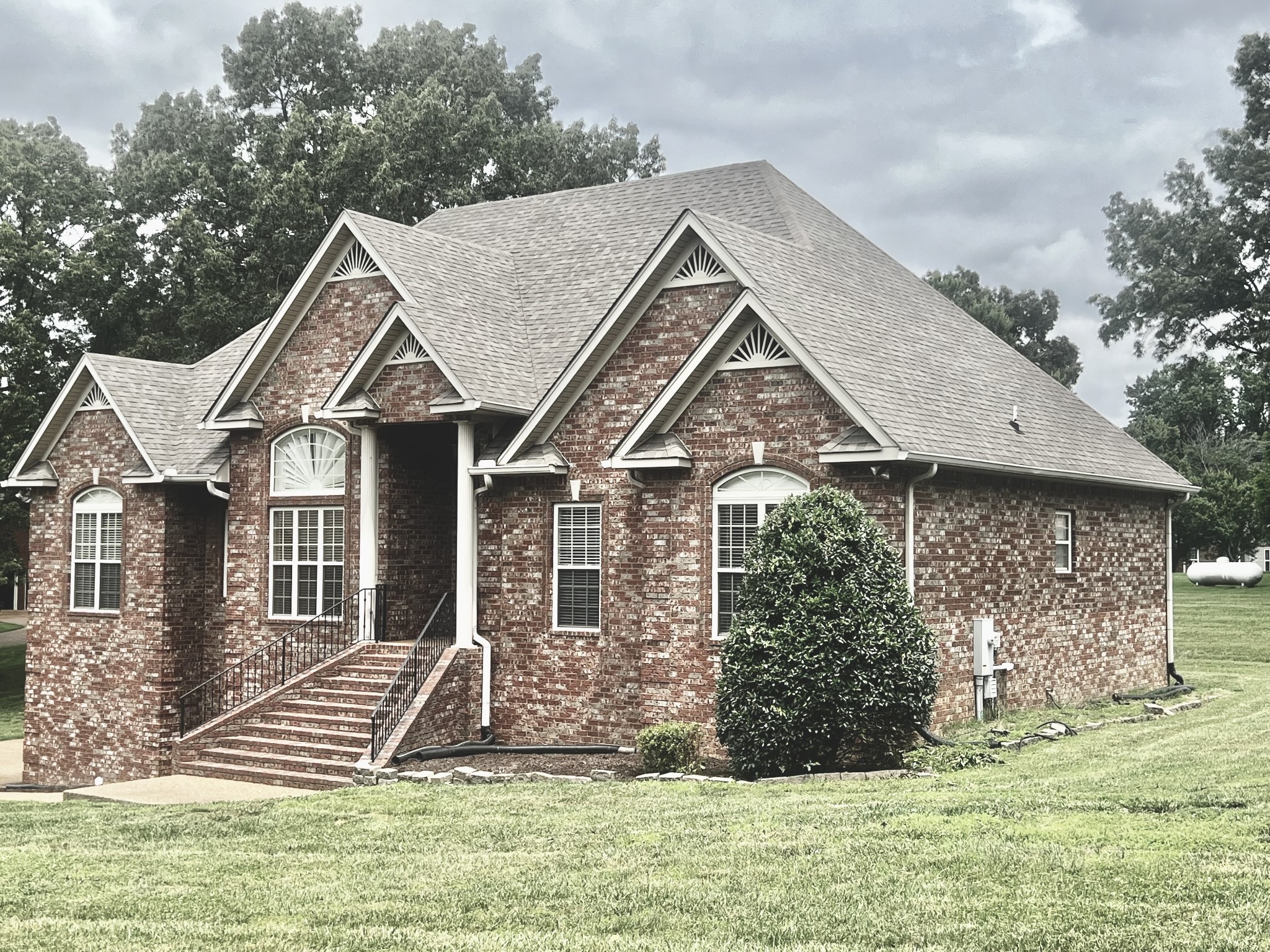 102 Spring View Place Cottontown, TN 37048 - Photo 38 of 40 front view of a house with a yard