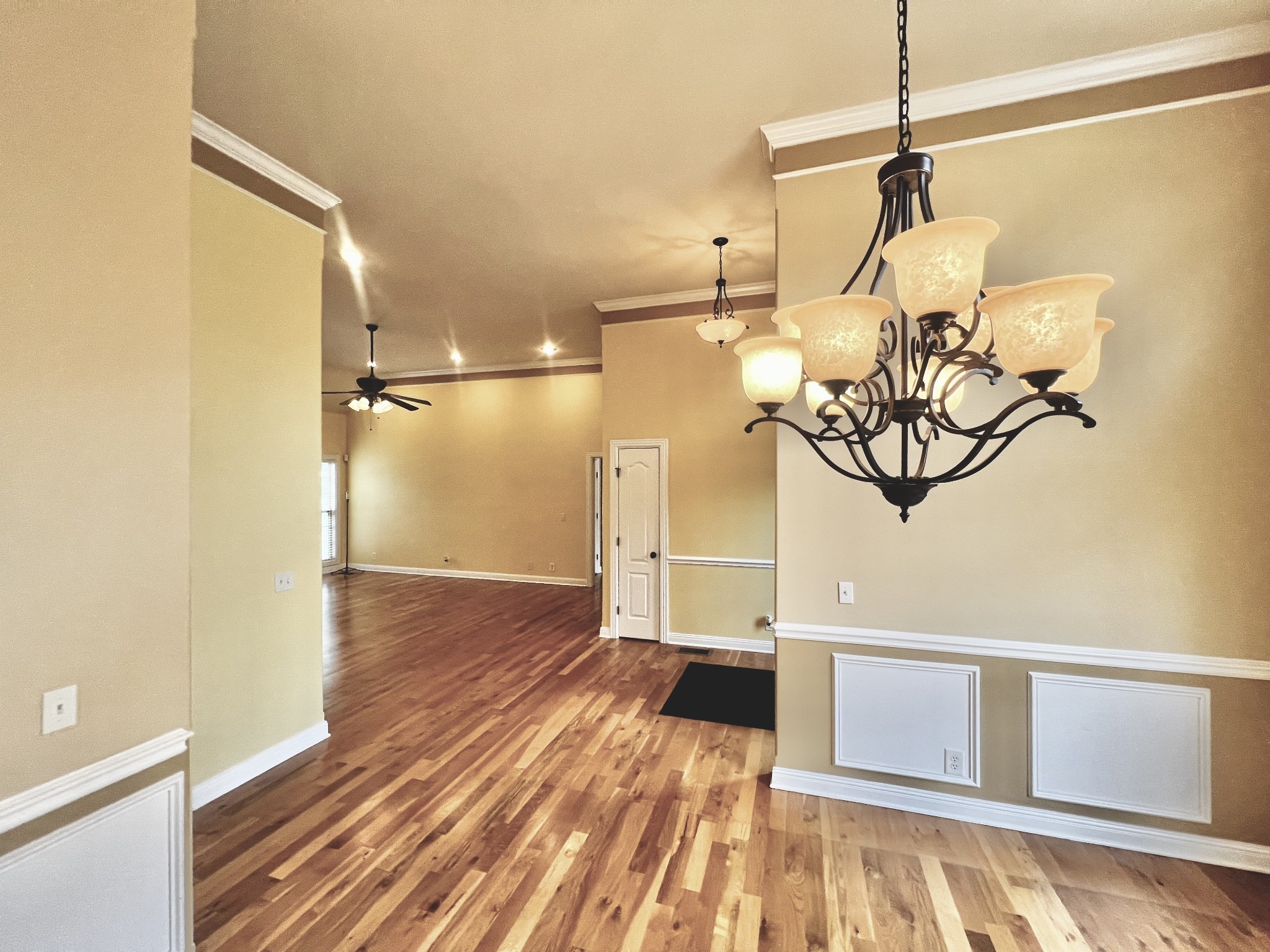 102 Spring View Place Cottontown, TN 37048 - Photo 5 of 40 a view of a room with wooden floor and door