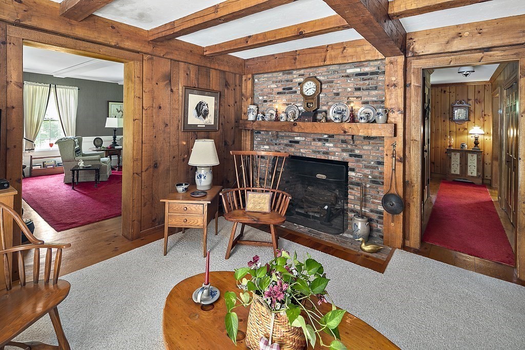 98 Plain Street Middleboro, MA 02346 - Photo 11 of 25 a living room with furniture and a fireplace