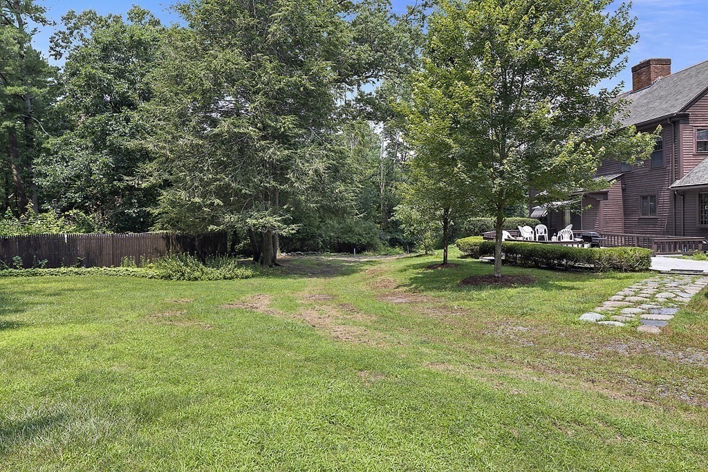 98 Plain Street Middleboro, MA 02346 - Photo 19 of 25 a view of backyard with a garden and entertaining space