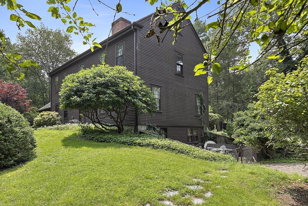 98 Plain Street Middleboro, MA 02346 - Photo 2 of 25 a backyard of a house with lots of green space