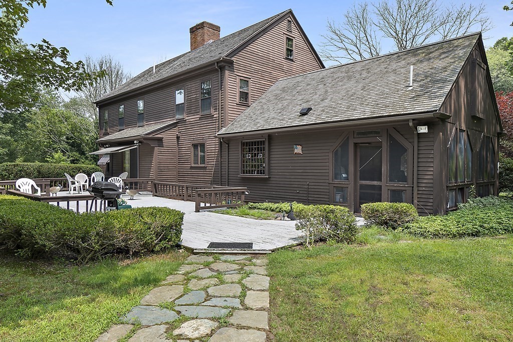 98 Plain Street Middleboro, MA 02346 - Photo 3 of 25 a front view of a house with garden