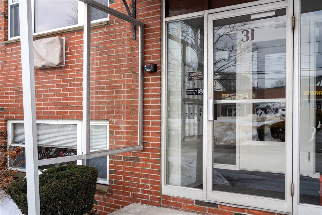 31 Warren Street, Unit B1 Waltham, MA 02453 - Photo 19 of 22 a view of a door and a window
