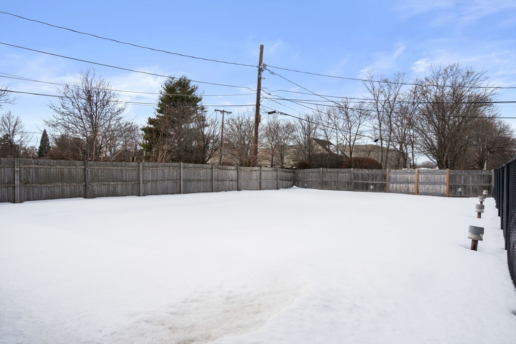 31 Warren Street, Unit B1 Waltham, MA 02453 - Photo 21 of 22 a view of a backyard of the house