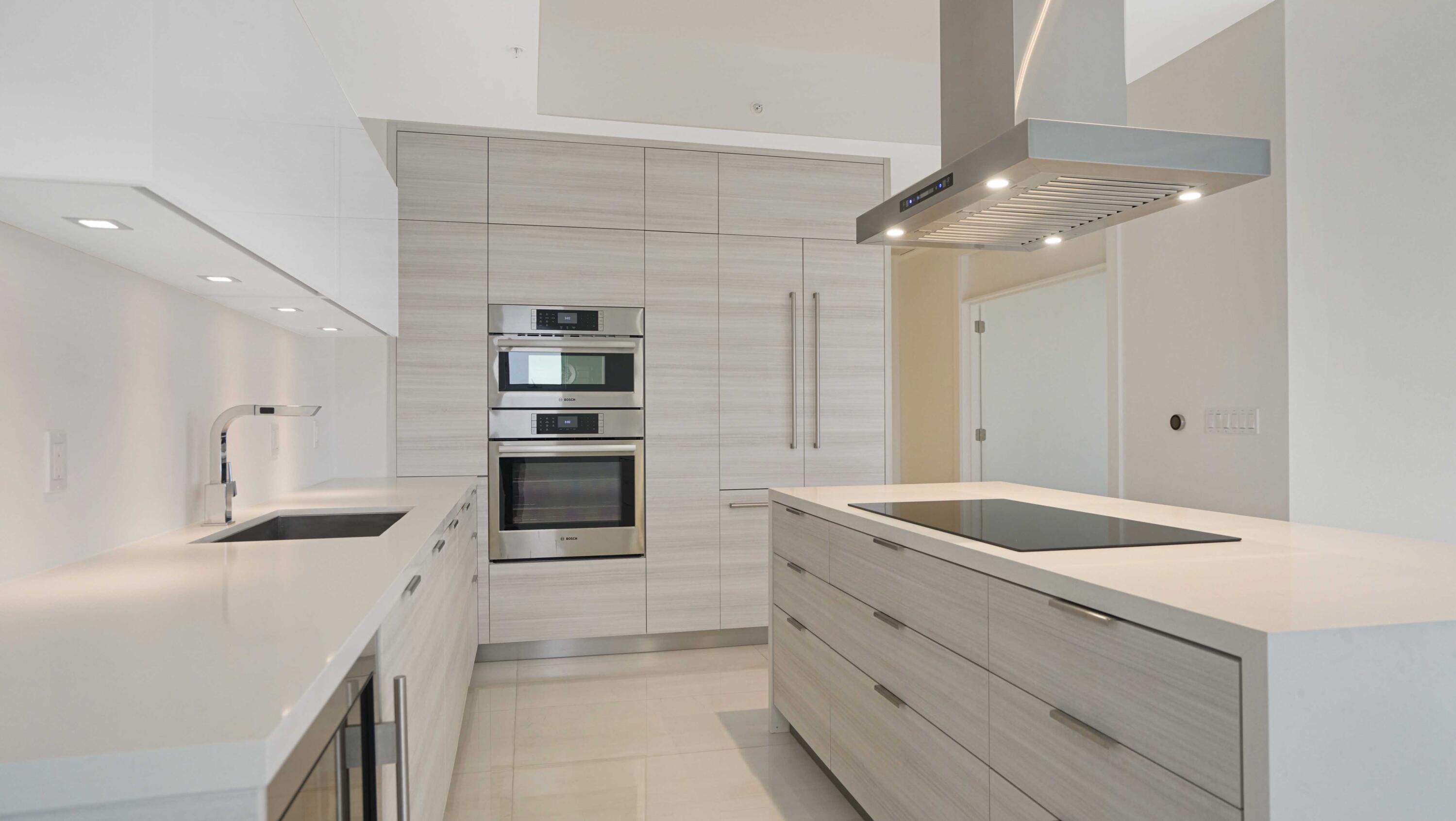 155 East Boca Raton Road, Unit 620 Boca Raton, FL 33432 - Photo 12 of 79 a kitchen with granite countertop a sink and stainless steel appliances