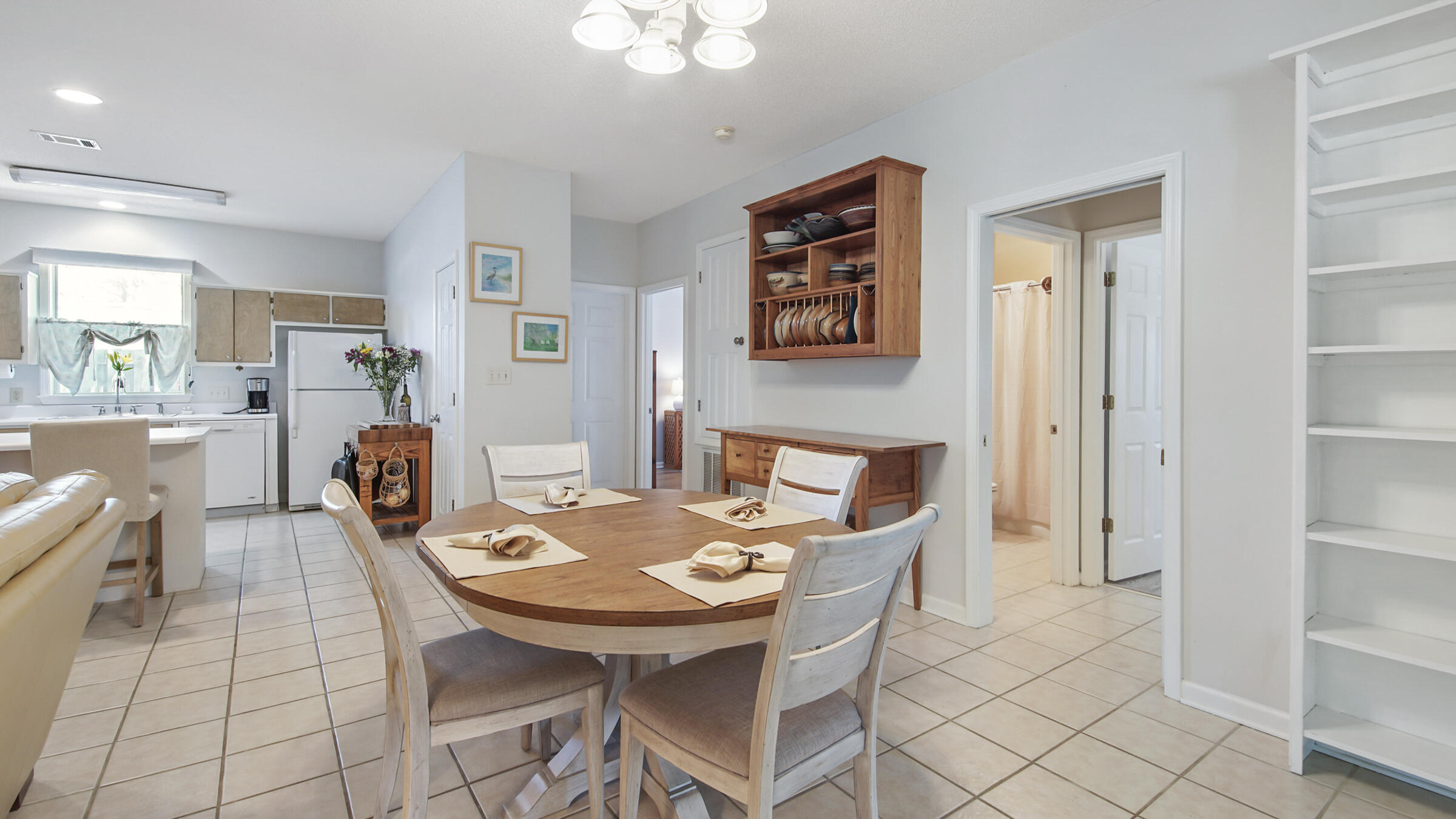 148 Ash Street Santa Rosa Beach, FL 32459 - Photo 22 of 41 a view of a dining room with furniture