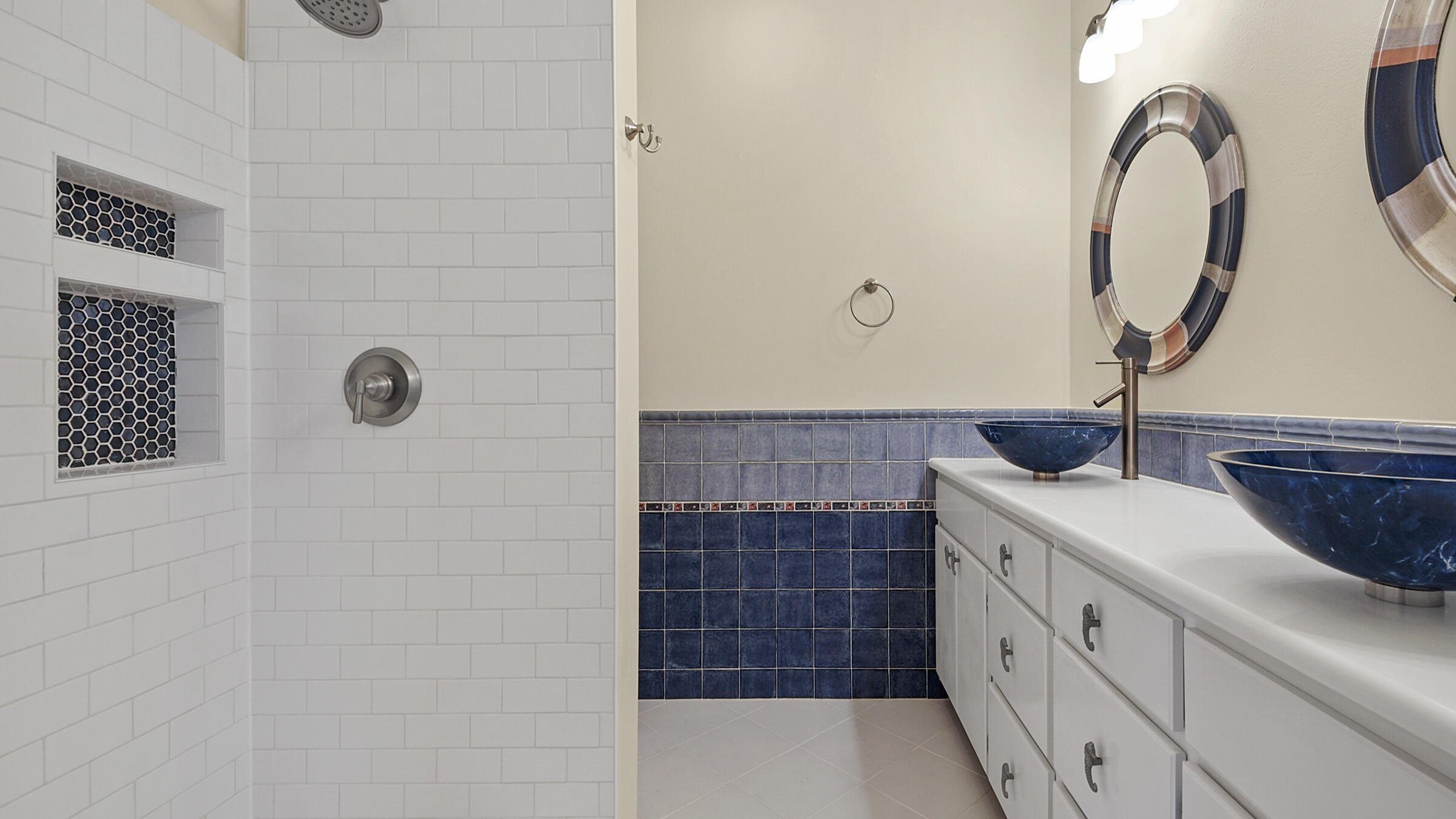 148 Ash Street Santa Rosa Beach, FL 32459 - Photo 24 of 41 a bathroom with a sink a vanity and mirror