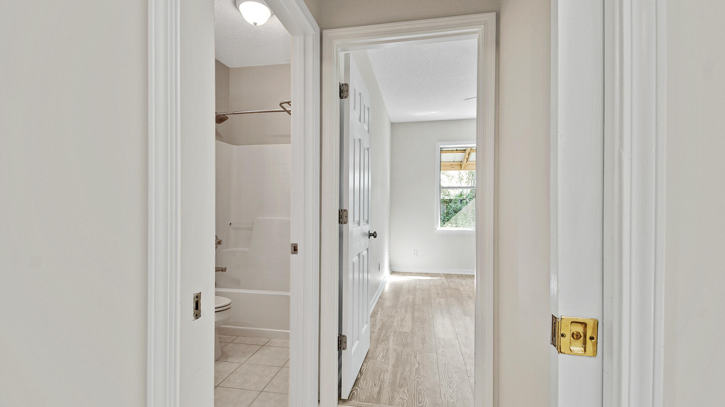 148 Ash Street Santa Rosa Beach, FL 32459 - Photo 27 of 41 a view of a bathroom with a shower and a sink