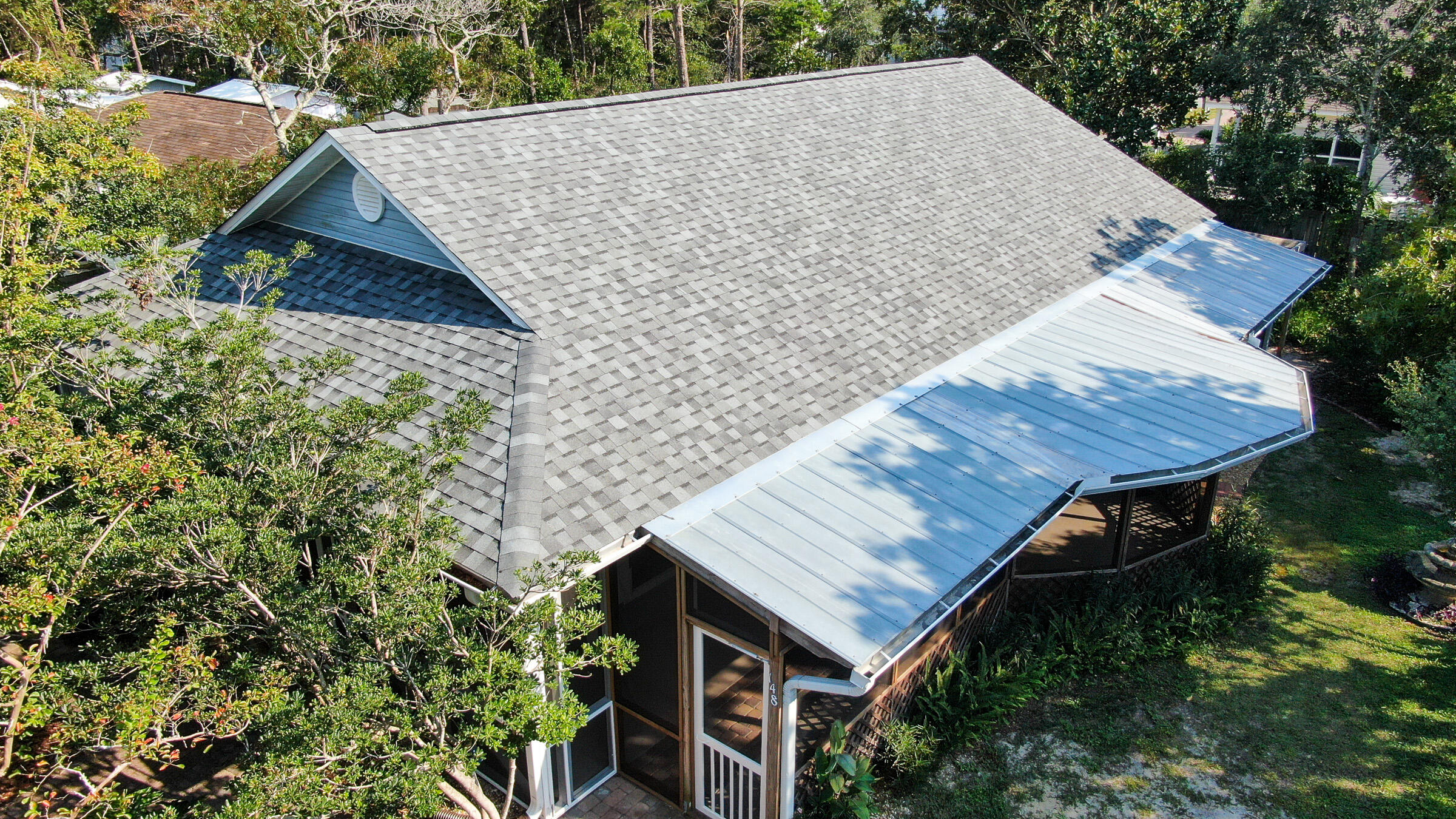 148 Ash Street Santa Rosa Beach, FL 32459 - Photo 4 of 41 an aerial view of a house with a yard and large trees