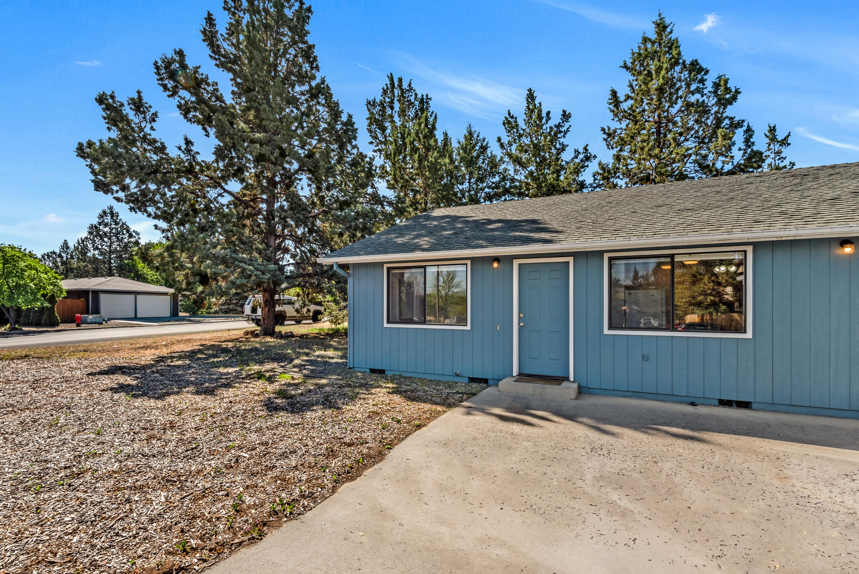 1916 Northeast Wichita Way Bend, OR 97701 - Photo 20 of 38 a front view of a house with a garden