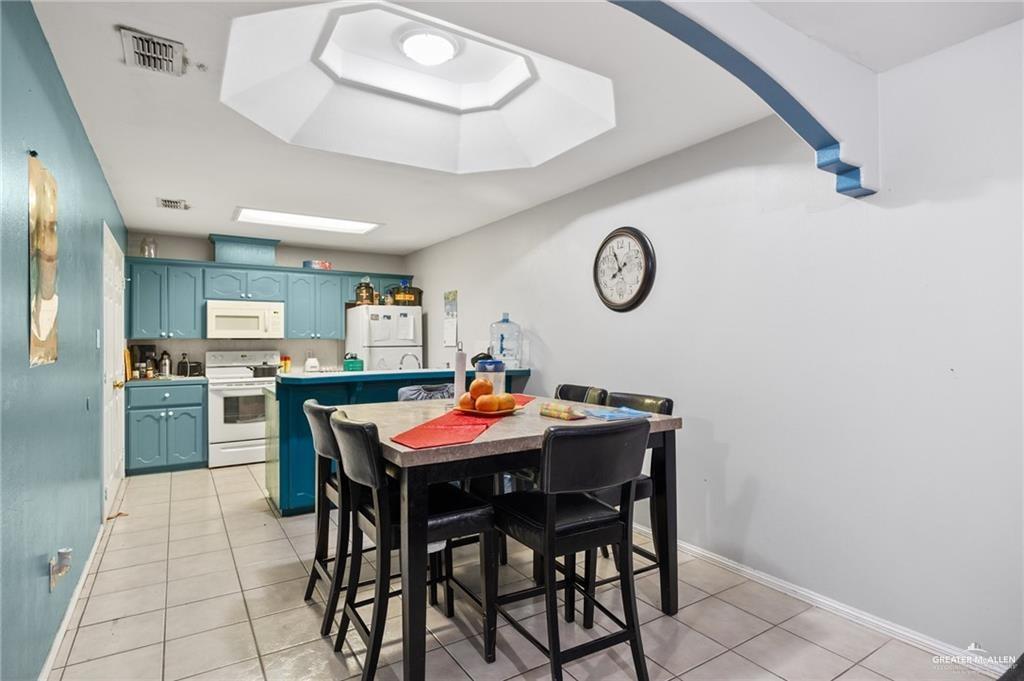 1504 Prosperity Drive, Unit 1 Edinburg, TX 78541 - Photo 11 of 18 a view of a dining area with furniture
