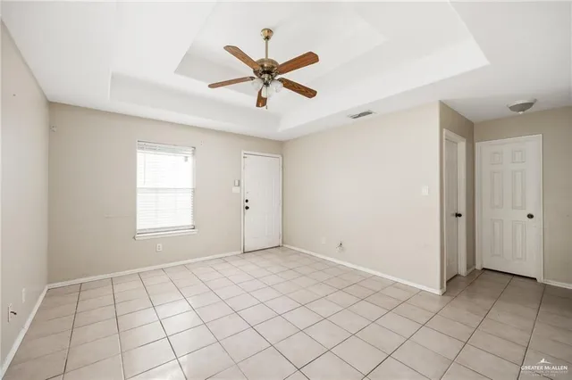 a view of an empty room and window