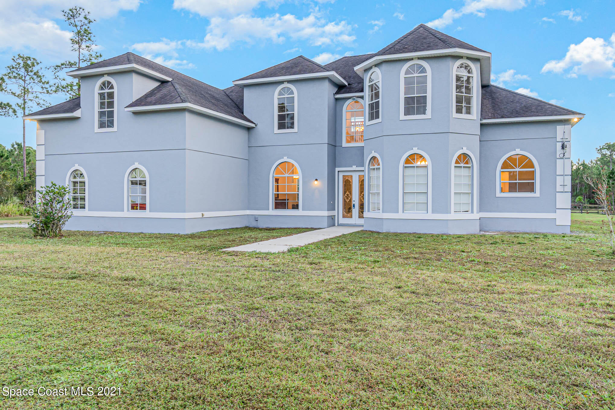10401 Bromeliad Road Mims, FL 32754 - Photo 2 of 58 Front
