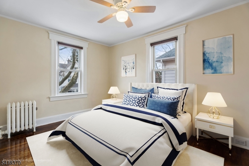 32 Edgewood Road Glen Ridge, NJ 07028 - Photo 18 of 32 a bedroom with a bed and a window