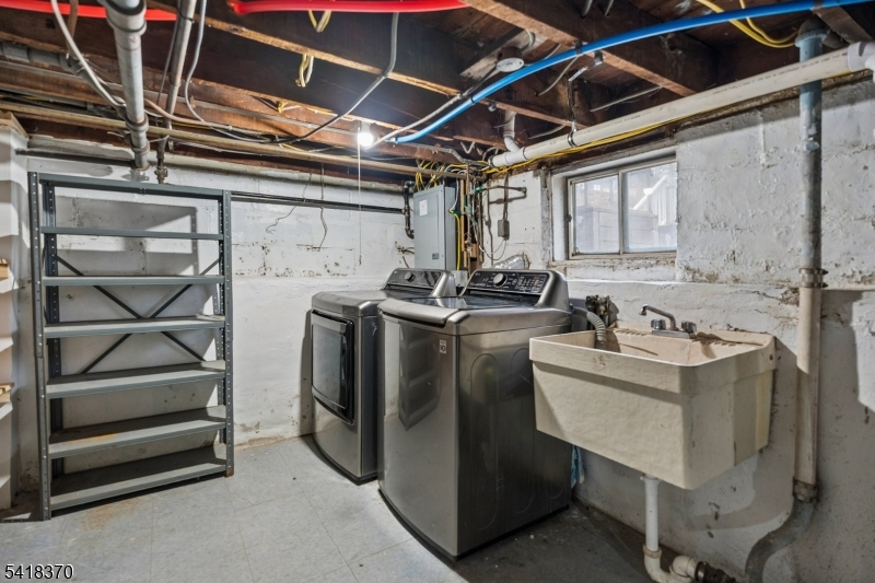 32 Edgewood Road Glen Ridge, NJ 07028 - Photo 27 of 32 a utility room with dryer and washer