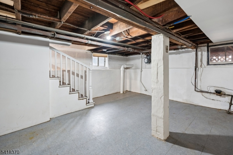 32 Edgewood Road Glen Ridge, NJ 07028 - Photo 28 of 32 a view of an empty room with stairs