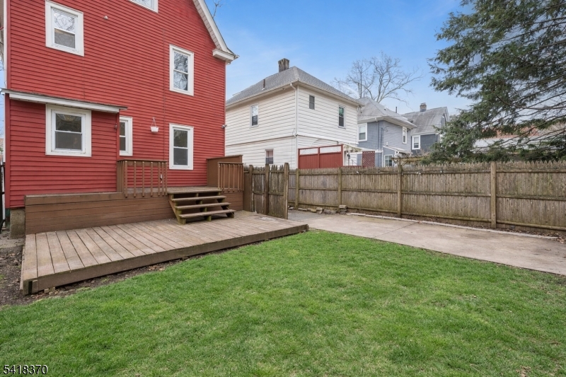 32 Edgewood Road Glen Ridge, NJ 07028 - Photo 31 of 32 a front view of a house with a yard