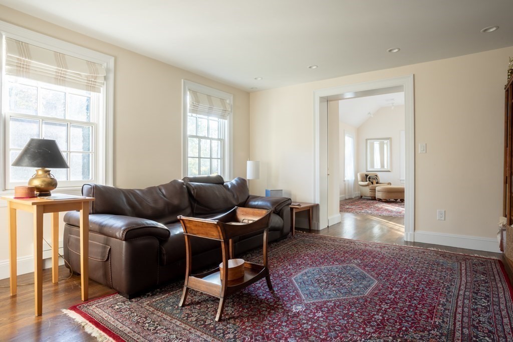 185 Franklin Street Newton, MA 02458 - Photo 17 of 23 a living room with furniture and a window