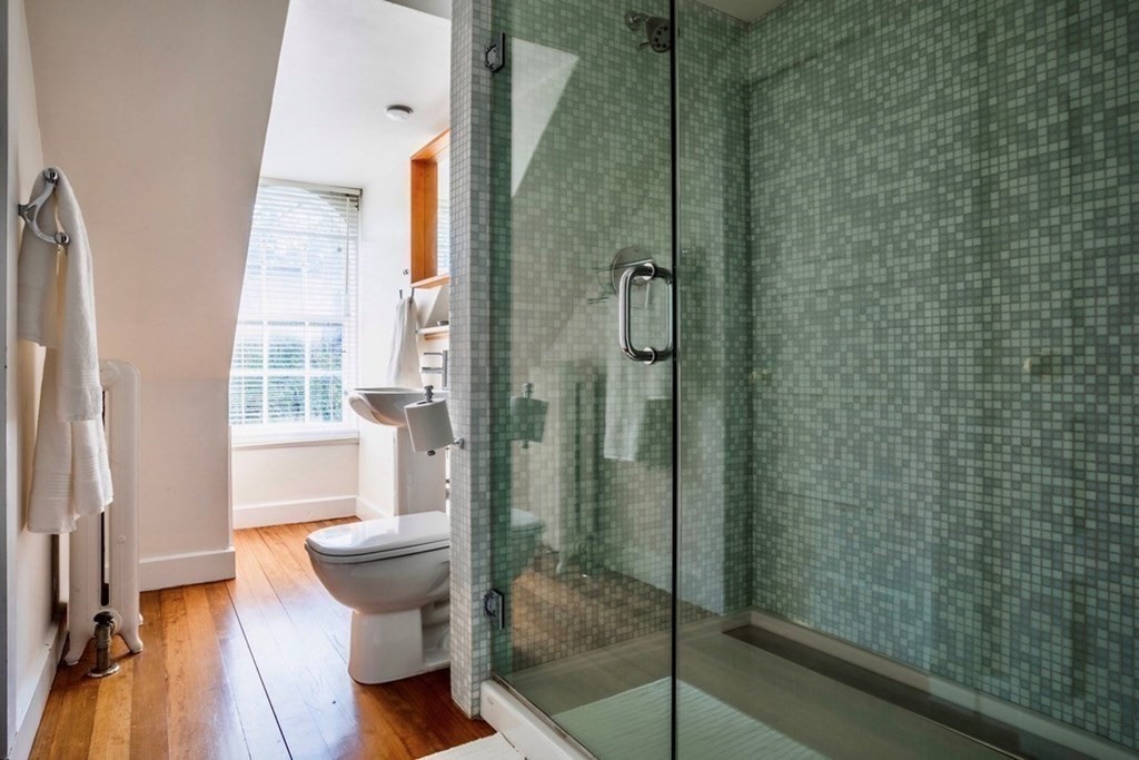 185 Franklin Street Newton, MA 02458 - Photo 21 of 23 a bathroom with a shower and a sink